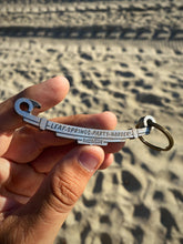 Load image into Gallery viewer, (Rusty) Leaf springs party harder bottle opener/keychain