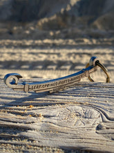 Load image into Gallery viewer, (Rusty) Leaf springs party harder bottle opener/keychain