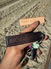 Load image into Gallery viewer, Give A Sh*t handmade leather keychain
